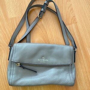 Kate spade crossbody bag,  adjustable strap, striped interior